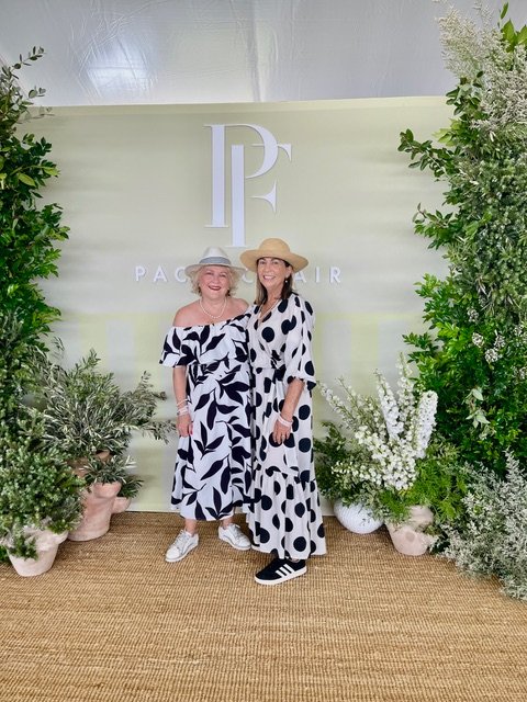 Stylish attendees enjoying Magic Millions Polo