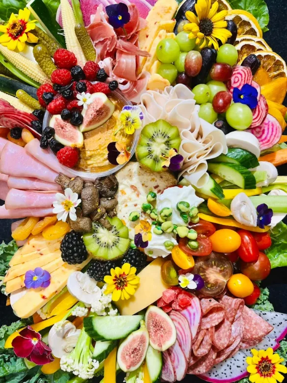 Gold Coast grazing platter with artisan cheese cured meats seasonal fruit and house-made dips by Nosh and Nibble