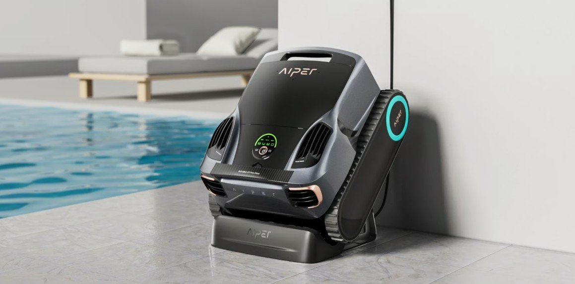 Aiper Scuba X1 Pro Max robotic pool cleaner sitting on the edge of my pool